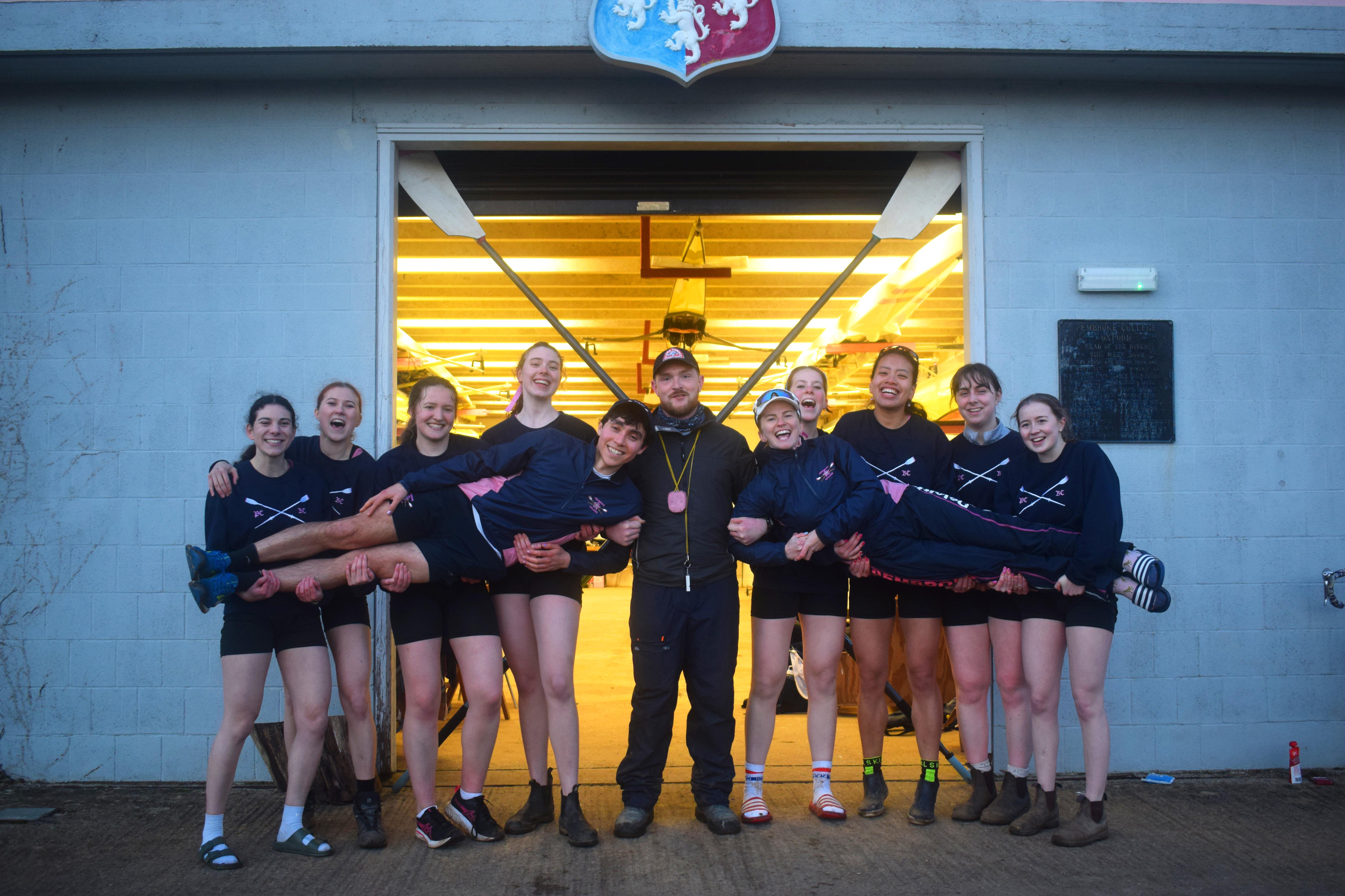 W1 in front of the Boathouse with their coach Simon, Erin Kennedy OBE, and their cox Nik Baya.